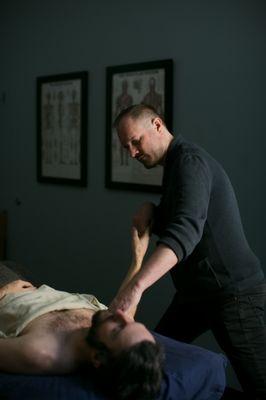 Owner, David Weintraub, performing bodywork technique.