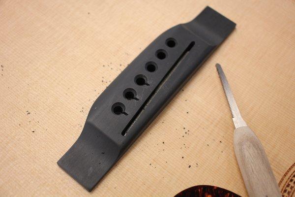 Acoustic guitar bridge repair