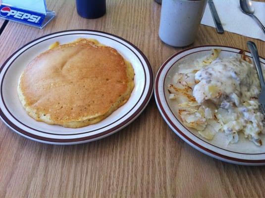 Pancakes and home fries with sausage gravy