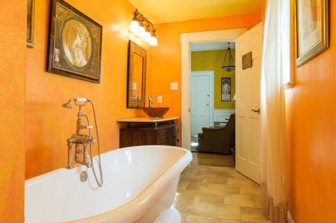 Large classic bathtub is the highlight of the bathroom for The Giovanni Room