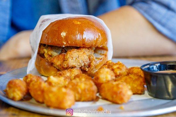 Spicy chicken sandwich and tots. Perfectly cooked breast & bomb tots