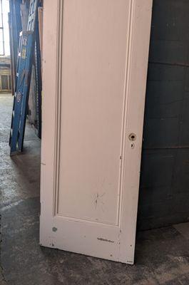 Would you pay $450 plus $250 shipping for a door with peeling paint that looks like this?