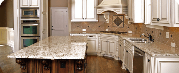 Light colored granite kitchen