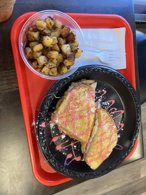 Breakfast cristo sandwich with home fries