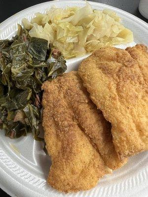 Two piece catfish with greens and cabbage.