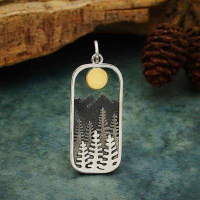 Sterling silver pendant with mountains and pine trees with a bronze sun