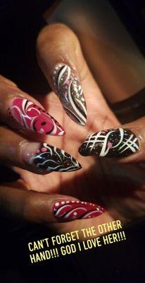 This is my other hand. Nelly hand paints each of my fingers differently.... her work!