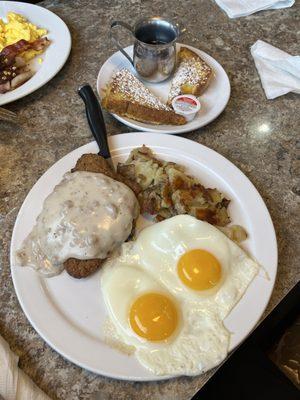 Country fried steak with home fries and French toast on the side!