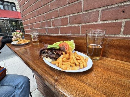 Black Sheep Burger  with nice season fries  and a local ALE beer  w the coworker :)  cheers