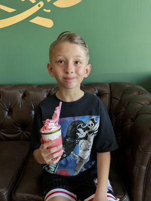 After his haircut with his Italian cream soda!