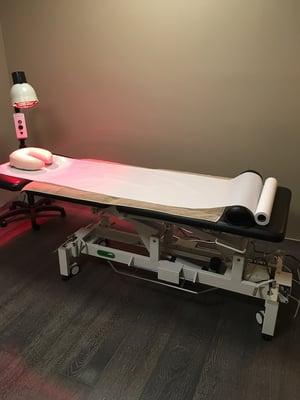 Professional treatment table and Infra-red light.