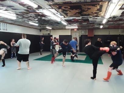 A typical kickboxing class.