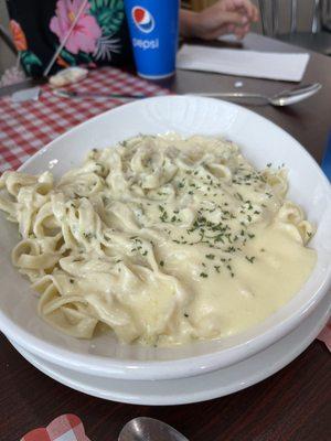 Homemade Fettuccine Alfredo after taking some bites...we were hungry!!!