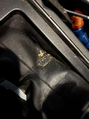 Gear shift area with missed dirt.