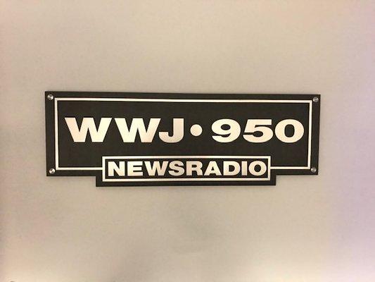 Radio station lobby sign, Black brushed aluminum with raised brushed aluminum letters and frame