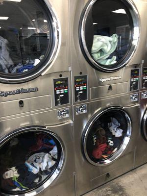 People waiting for a dryer while others have their clothes just sitting there and the employee doesn't do anything about it.