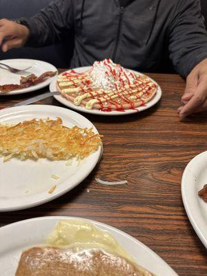 Strawberry Cheesecake pancakes and a side of hash browns