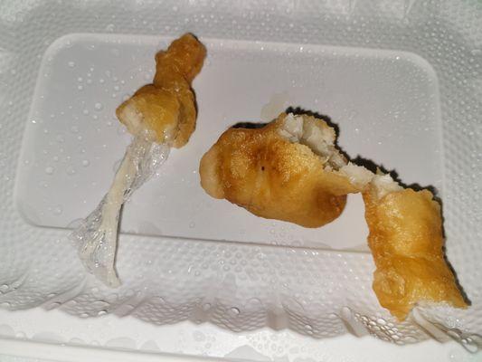 Fried Golden Chicken Fingers and cling wrap