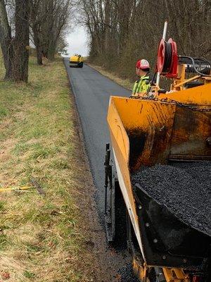 Asphalt paving driveways.