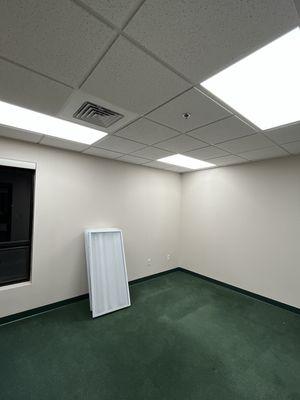 Commercial office building lighting fixture removal / installation.