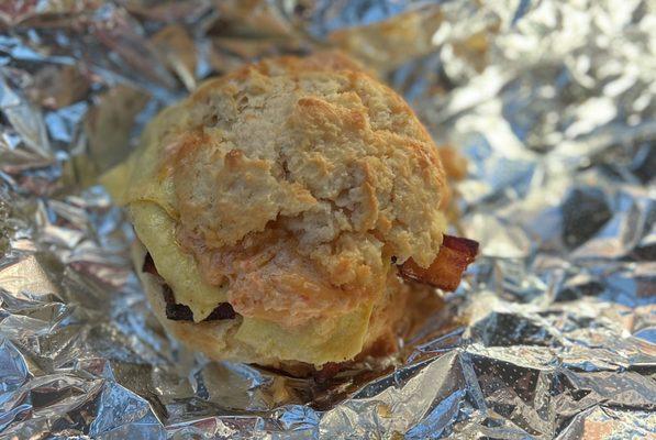 Breakfast biscuit sandwich with bacon, egg & pimento cheese.