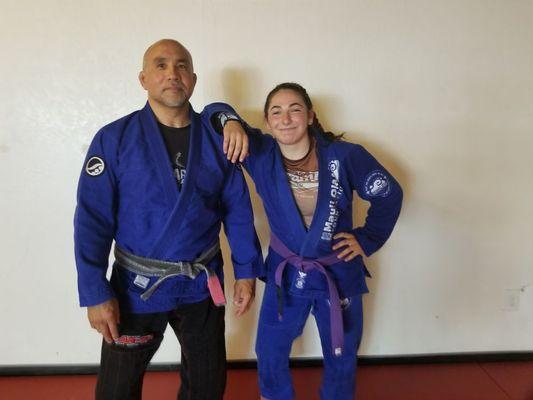 One of our first beginner students started BJJ at 14. Now at 18 she received her purple from Master Hulk.