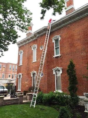 32' Gutter cleaning and down spout cleaning performed in Dayton's Oregon District.