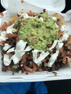 Super nachos $8.99 from the inside Taqueria