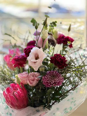 Stunning arrangement with quail bird. Such a joy to behold.