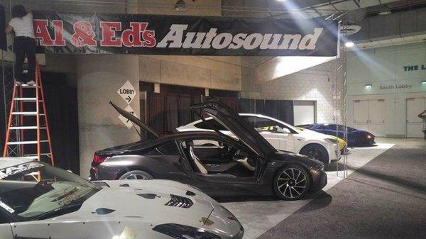 Al & Ed's Autosound representing at the LA Auto Show 2016 with a BMW I8...