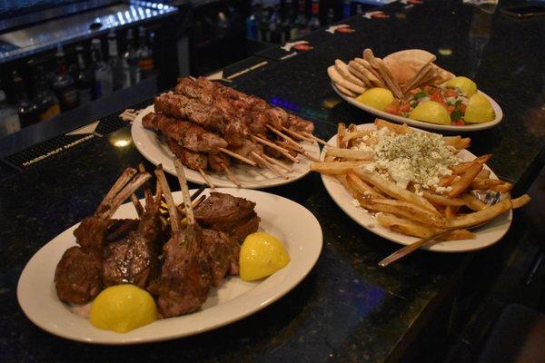 Double-cut lamb chops, pork souvlaki, Greek fries