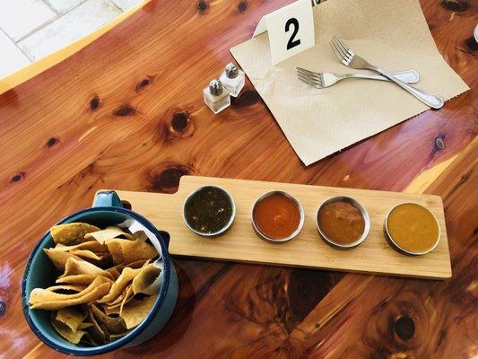 Chips and Salsa tasting-chipotle,molcajete, chile arbol salsa and house specialty sauce