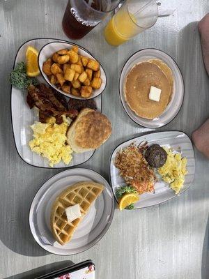 home fries, scrambled eggs, bacon, sausage, biscuit, hash browns   Food was delicious and service was great