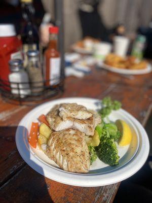 Rockfish over a bed of rice and veggies