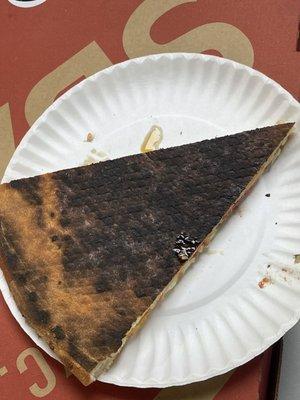 The pizza was cancer black. I could not even eat it. It's charcoal status. The entire pie.