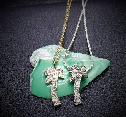 Palm tree pendants with diamonds