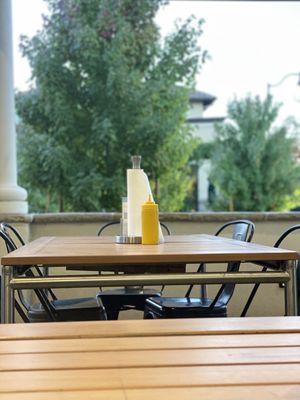 Super cool indoor/outdoor patio seating. Love this seating arrangement!