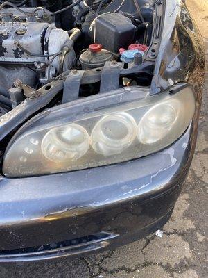 Before headlight restoration