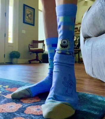 The monsters inc socks with Sulley and Mike