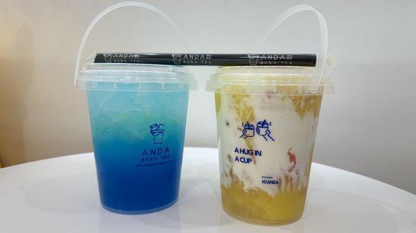 Blue raspberry sparkling lemonade, and mango pomelo in large cups, a.k.a. large buckets