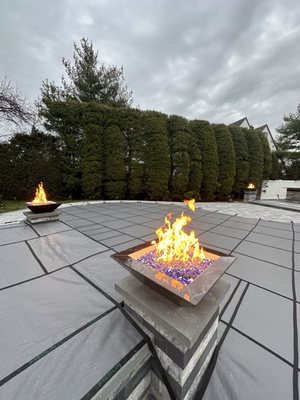 Fire bowls next to our jacuzzi and pool