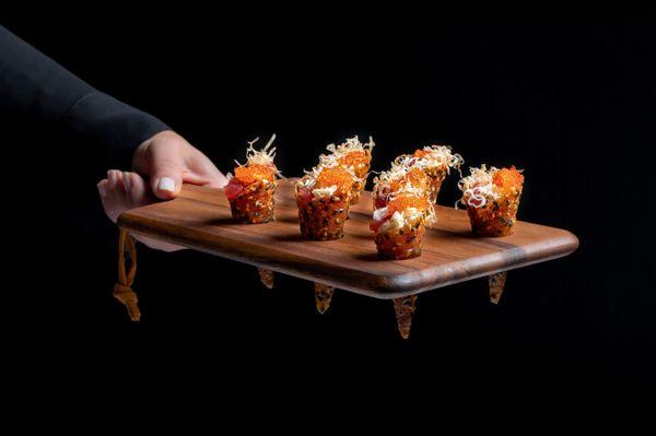 Artfully prepared side dish on a wood serving platter