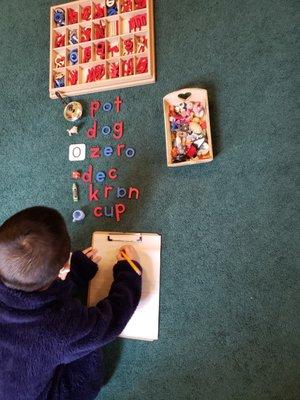 Our little guy spelling his own words!