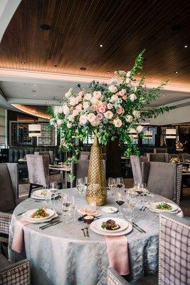 Elegant wedding table decorations by Wolfgang Puck Catering