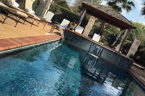 Our heated saltwater lap pool and hot tub at our Rock Prairie location.