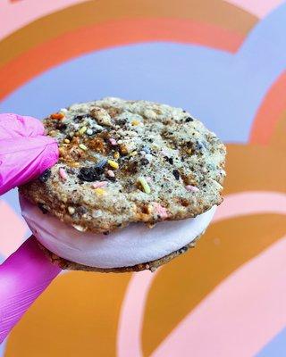 A sandcastle ice cream sammie. The cookie is made using all of our soft serve toppings!