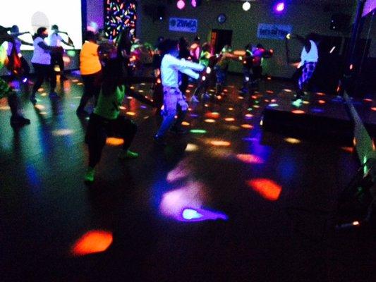 Unite-4-Fitness Glow Party featuring MixxedFit, SocaFit, and Zumba Fitness formats.