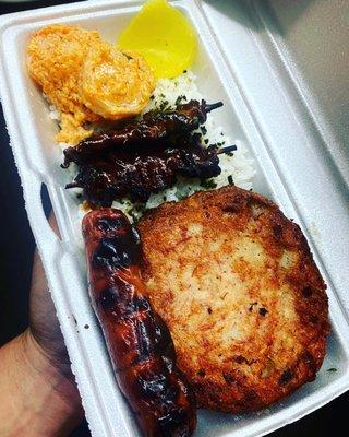 Corned beef hash patty bento. Who else gets such an array of land and sea on one plate.