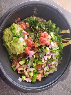 Double chicken bowl,rice,queso,cilantro,tomatos,habanero , guac, jalapenos