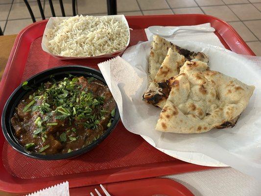 Goat Curry with fresh Naan and rice